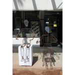 Pair of Articulated Metal Figures