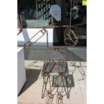 Pair of Articulated Metal Figures