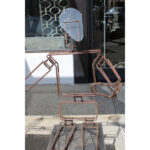 Pair of Articulated Metal Figures