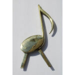 Pair of Brass and Cast Iron Musical Note Andirons