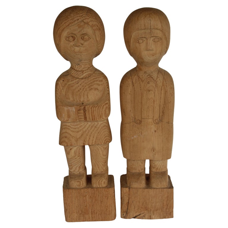 Hand-Carved Folk Art Sculptures of Man and Woman circa 1950s