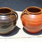 Pair of Handled Orange, Charcoal Stoneware Planters