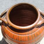 Pair of Handled Orange, Charcoal Stoneware Planters