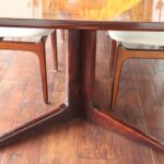 Dining Table, Eight Chairs, Two Leaves by Eric Buck, Made in Denmark
