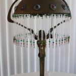 Bronze Lamp by Albert Reimann (cabachon jewels, glass rod, bead fringe)